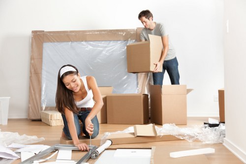 Local moving team handling boxes and furniture in Maida Vale