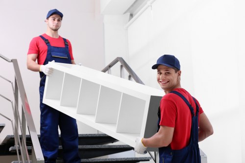 Team member checking a moving load for safety