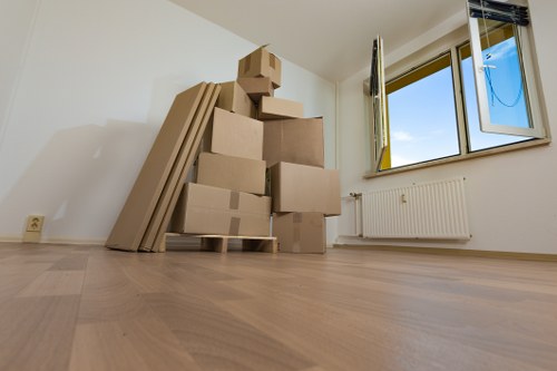 Worker safely loading items into a moving van