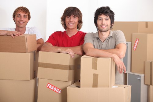 Loading furniture into a van for a local move in Maida Vale