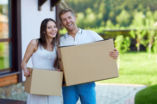 House removals team preparing moving boxes in Maidavale