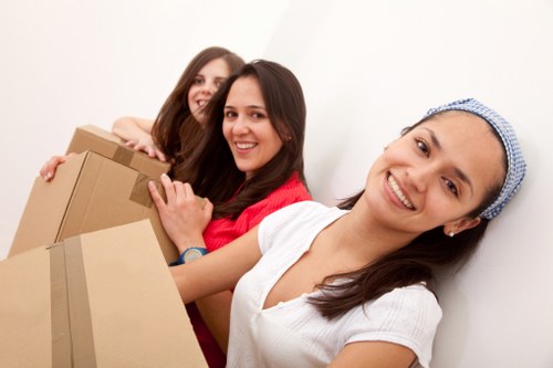 Packed student items and storage-ready boxes for Maidavale removals