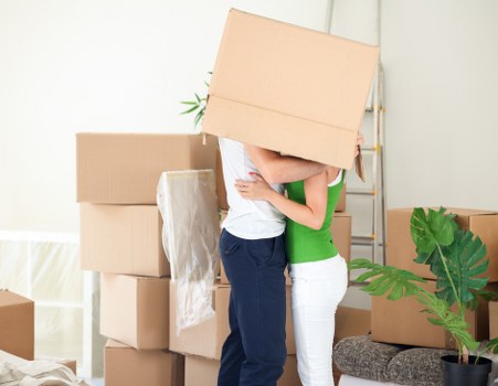 Reliable man with a van service loading items carefully