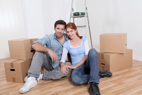 Removal crew loading household items for transport