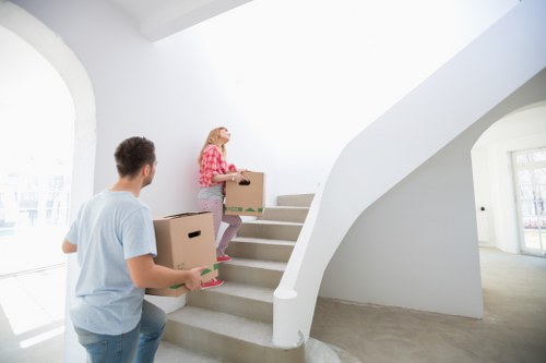 House removalists in Maidavale transporting furniture with protective equipment