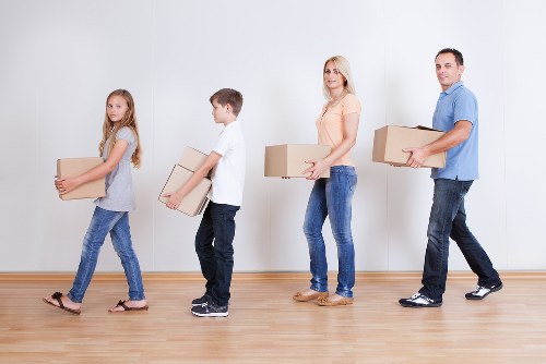 Careful loading of household items for a move near Maida Vale