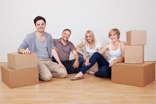Packed boxes and furniture ready for local removals in Maida Vale