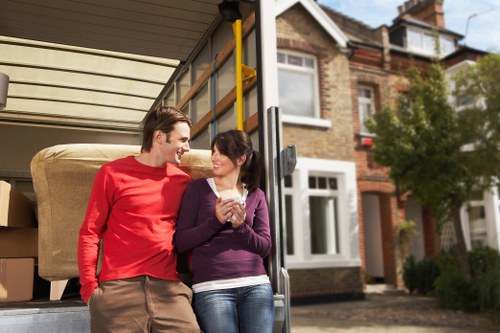 Loading household items into a moving truck in Maidavale