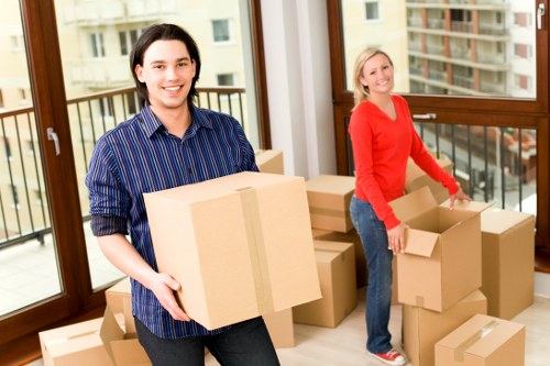 Team handling large furniture collection in Maidavale property